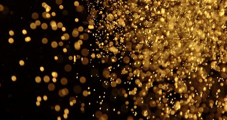 Abstract particles of gold dust float in the air - Powered by Adobe