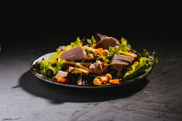 Bowl of salad with tuna steak