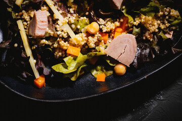 Bowl of salad with tuna steak