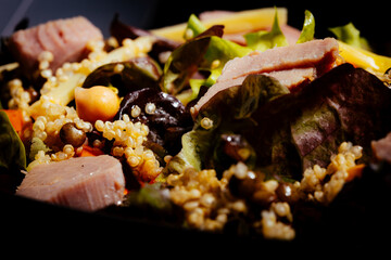 Bowl of salad with tuna steak