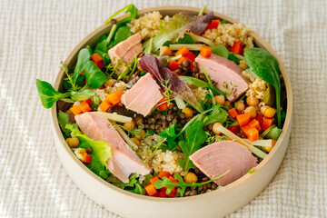 Bowl of salad with tuna steak