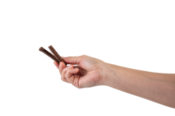 Chocolate bar in hand on transparent background