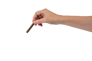 Chocolate bar in hand on transparent background