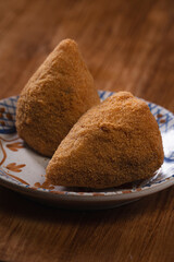 Two Sicilian Arancini on Plate: Pair of Fried Rice Balls for Sharing Italian Street Food