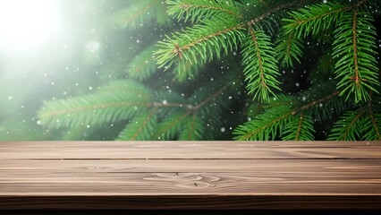 Wooden table top with evergreen branches and sunlight background for display
