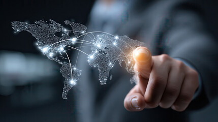 Hand interacting with a glowing digital world map network