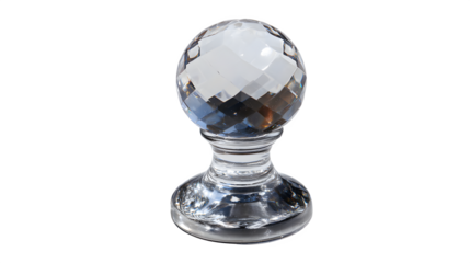 A single faceted crystal ball knob with a clear base against a dark black background in a studio shot