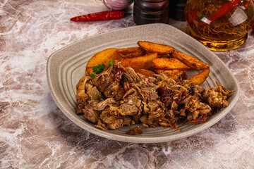 Baked shredded pork with potato