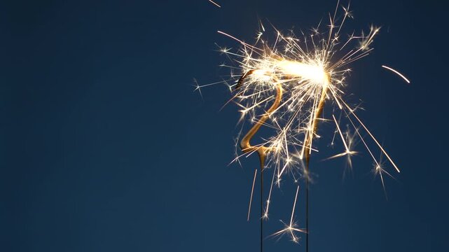 27 years celebration festive background made with Bengal fires in the form of number Twenty-seven.