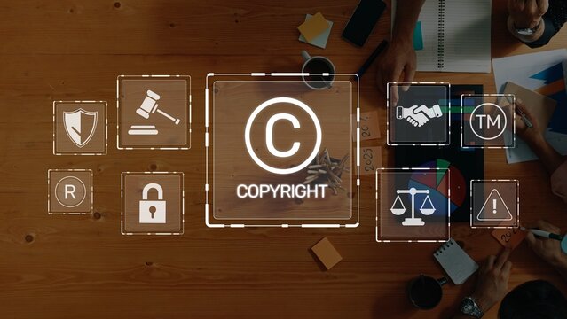 Professionals engage around a wooden table discussing copyright symbols and concepts of intellectual property rights, emphasizing creativity and collaboration during their meeting. Raster