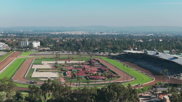 Aerial telephoto panning shot of the Santa Anita Park horse racing track in Arcadia, California. 4K