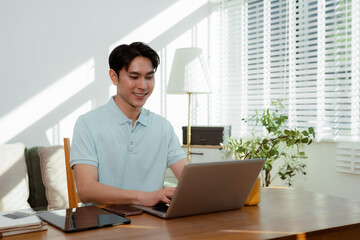 Lifestyle people, Mature male working with laptop and documents on desk, small business owner working online.