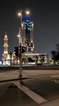 Modern Arabian Design Skyscraper Illuminated at Night - Doha Skyline