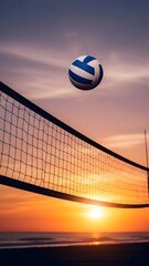 A beach volleyball floats gracefully over the net during a stunning sunset at the beach.