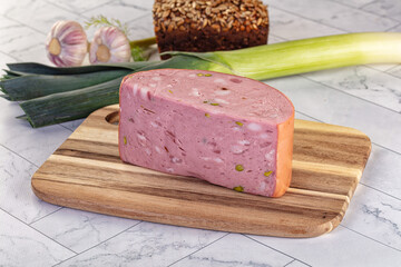 Italian Mortadella pork sausage piece