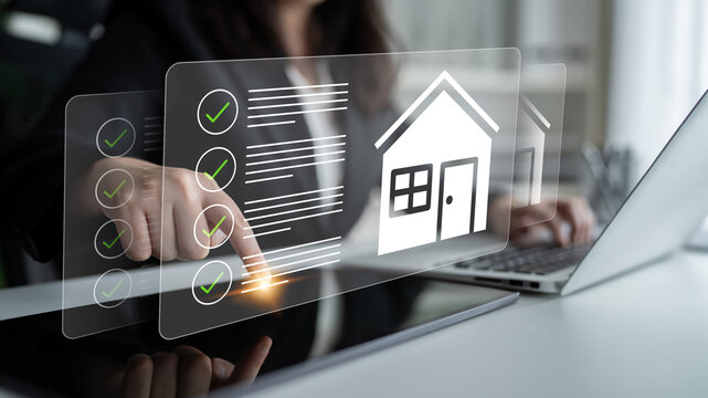 Businesswoman Using Digital Tablet with House Icons and Checklists for Real Estate Management and Investment Planning in Modern Office Environment Gantry.