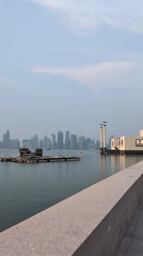 Doha City Skyline with Traditional Dhow Boats in Persian Gulf - Qatar Landscape