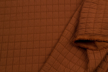 Fototapeta premium Quilted fabric. The texture of the blanket. Background to your project