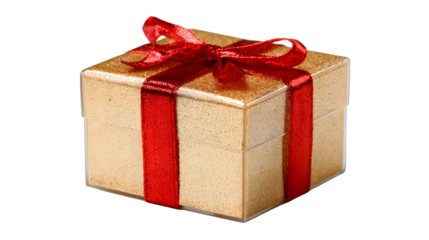 A golden gift box tied with a red ribbon on a black background for a special occasion present idea