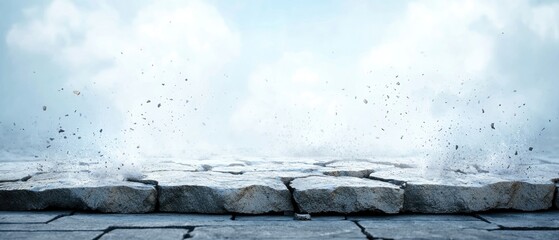 A stone surface with debris and a cloudy sky background, creating a dramatic and dynamic scene.