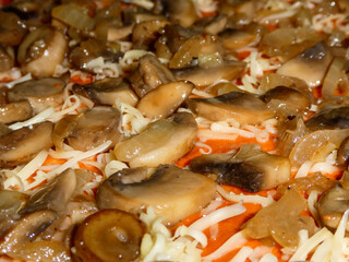 Uncooked Homemade Pizza Topping with Sautéed Mushrooms