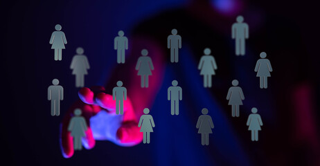 Hand reaching toward human symbols representing communication, relationships and social media concepts in the d