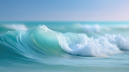 Gentle turquoise waves with foamy crests rolling onto the shore in a serene beach landscape under soft sunlight on a peaceful summer day