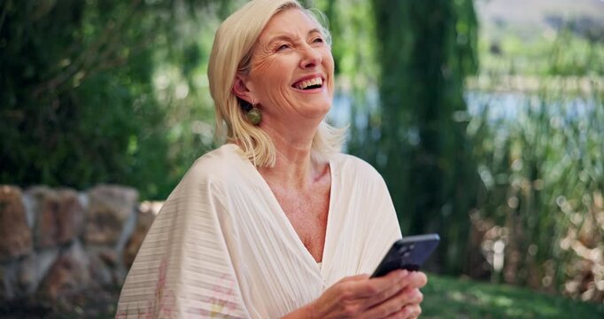 Woman, scroll and laugh outdoor with phone for funny social media video, text message and joke. Happy, mature person and browsing with tech in nature for online communication, internet meme or humor.