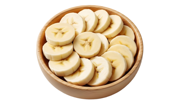 Sliced bananas in wooden bowl overhead view