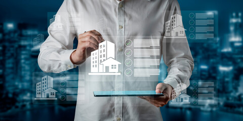 A businessman uses a digital tablet to manage real estate projects, showcasing a modern office setting with an urban skyline and virtual interface for enhanced productivity. Gantry