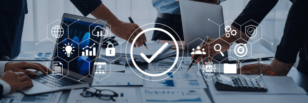 Professionals collaborate in a stylish office, utilizing digital devices for strategic planning. Technology icons symbolize innovation and teamwork in business success. Gantry - Powered by Adobe