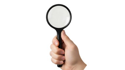 Hand holding magnifying glass against black background