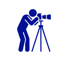 Silhouette of Photographer with Camera on Tripod Capturing Moments Through the Lens with Professionalism and Artistic Vision