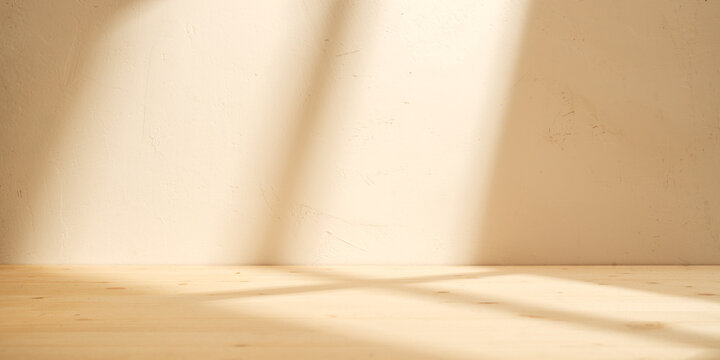 Wooden table mockup on stucco background with branch shadows on the wall. Mock up for branding products, presentation and health care.	
