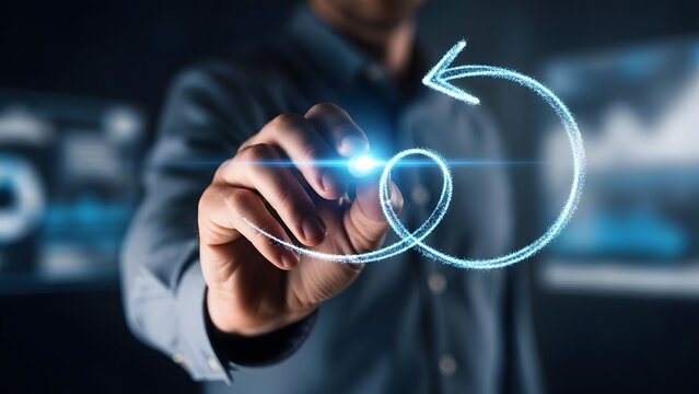 Businessman drawing circular arrow on transparent screen representing business process improvement