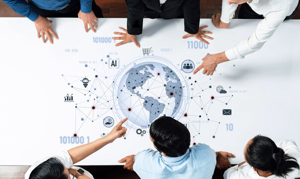 A diverse business team collaborates over a digital world map on the table, discussing strategy, data insights, and innovative solutions in a modern office setting. Trope