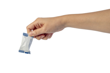Plastic bag snack packaging and hand holding isolated on transparent background