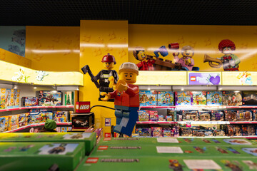 Naklejka premium Large Lego minifigure statue in toy store