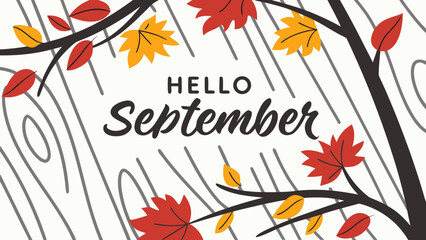 The phrase “HELLO SEPTEMBER” written in bold English style font, with colorful autumn leaves scattered on a rustic wooden background, celebrating cozy fall season 