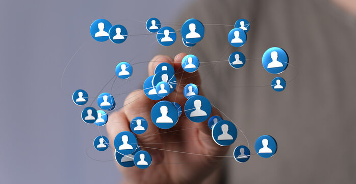 Concept of global communication, connectivity, and social media. Hand interacting with a network of user icons, symbolizing connection and the d