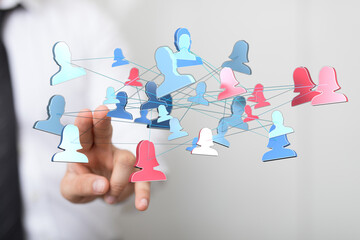 Abstract network of people with hand pointing at the center. Concepts: connection, communication, collaboration, teamwork, global, network, data