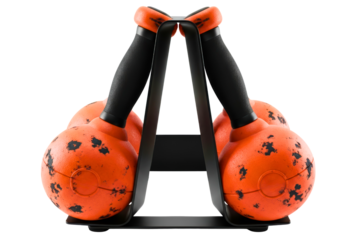 Pair of orange textured dumbbells resting on black metal stand isolated with transparent background