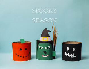 Colorful Halloween-themed paper crafts featuring pumpkin, witch, and ghost designs for autumn vibes