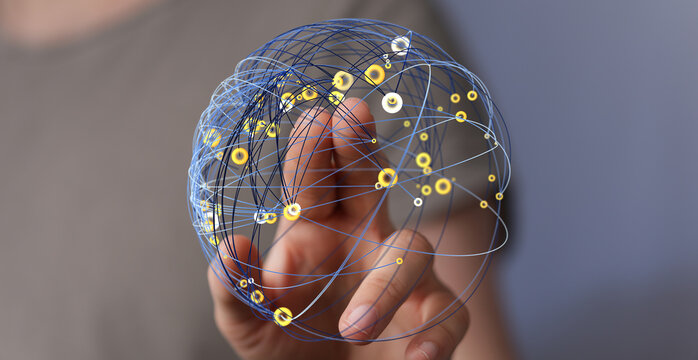 An image of a hand holding a digital network sphere, representing global connections, data transfer and technological innovation. Con