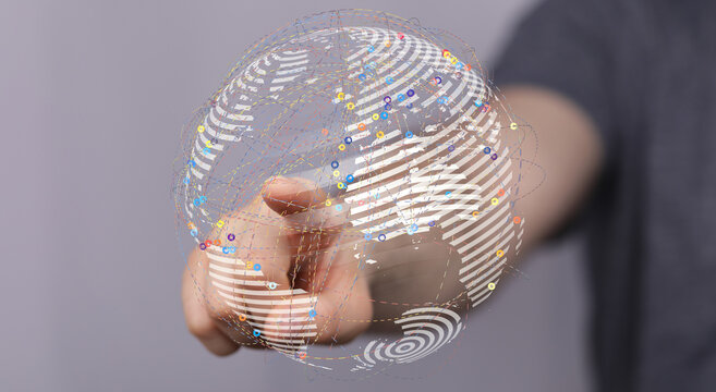 A person's finger touching a digital globe representing global connection, network, technology and communication. Modern design conce