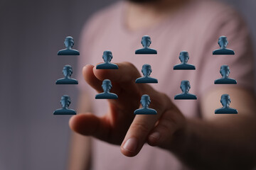 Concept of team work, organization and business. Connecting, social network and the interaction. Group of people and digital interface
