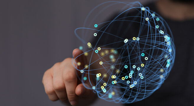 Hand touching a digital network sphere, concept of global connection, technology, internet, and communication. Modern abstract background with b