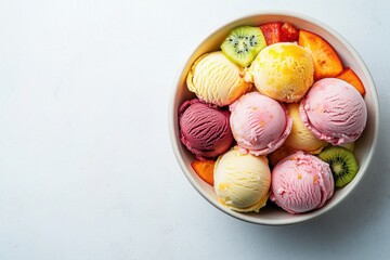 Top down view of bowl filled with colorful scoops of ice cream and fresh fruit slices including kiwi and peach, creating vibrant and refreshing dessert presentation