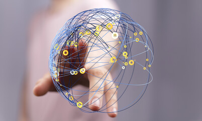 An image of a hand touching a network globe symbolizing international connections, technology, and global communication.
