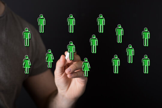 Hand drawing people icons on a black surface symbolizing teamwork, communication, and connectivity across a digital network. Perfect for busines - Powered by Adobe